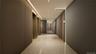 Corridor with recessed lighting and elevator