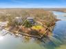 View of property location with property parcel outlined and a nearby body of water
