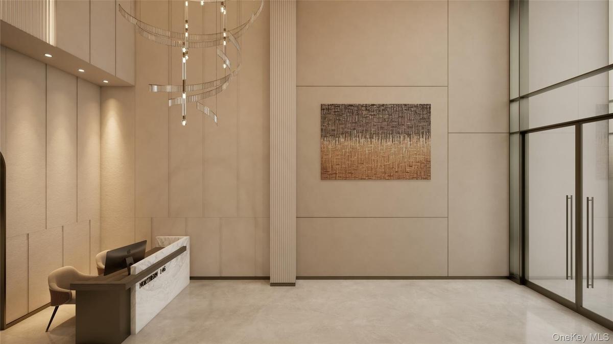 Lobby featuring a towering ceiling