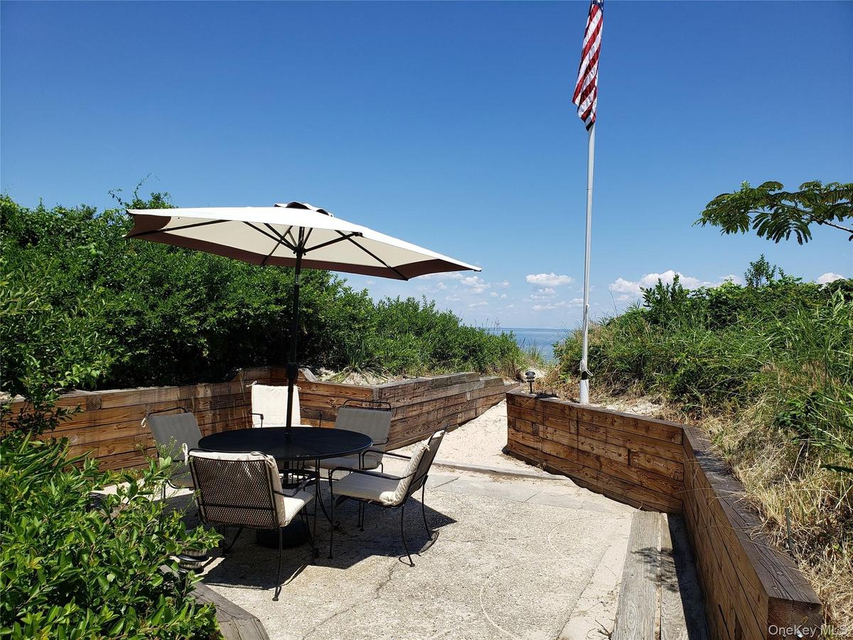 View of patio with outdoor dining area