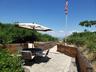 View of patio with outdoor dining area