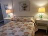 Bedroom with a baseboard heating unit