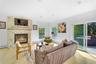 2nd story living room with natural gas fireplace
