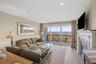 Living room with sliding glass doors to the deck and Long Island Sound Views.