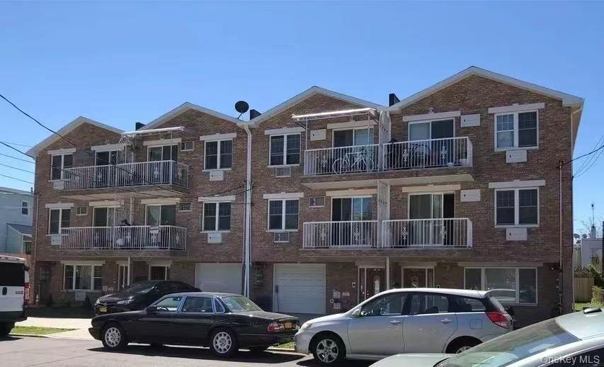 Multi-level brick exterior building with peaked gables