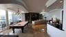 Game Room with entertainment center and second kitchen.