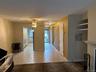 View of entrance, eat-in kitchen and dining area.