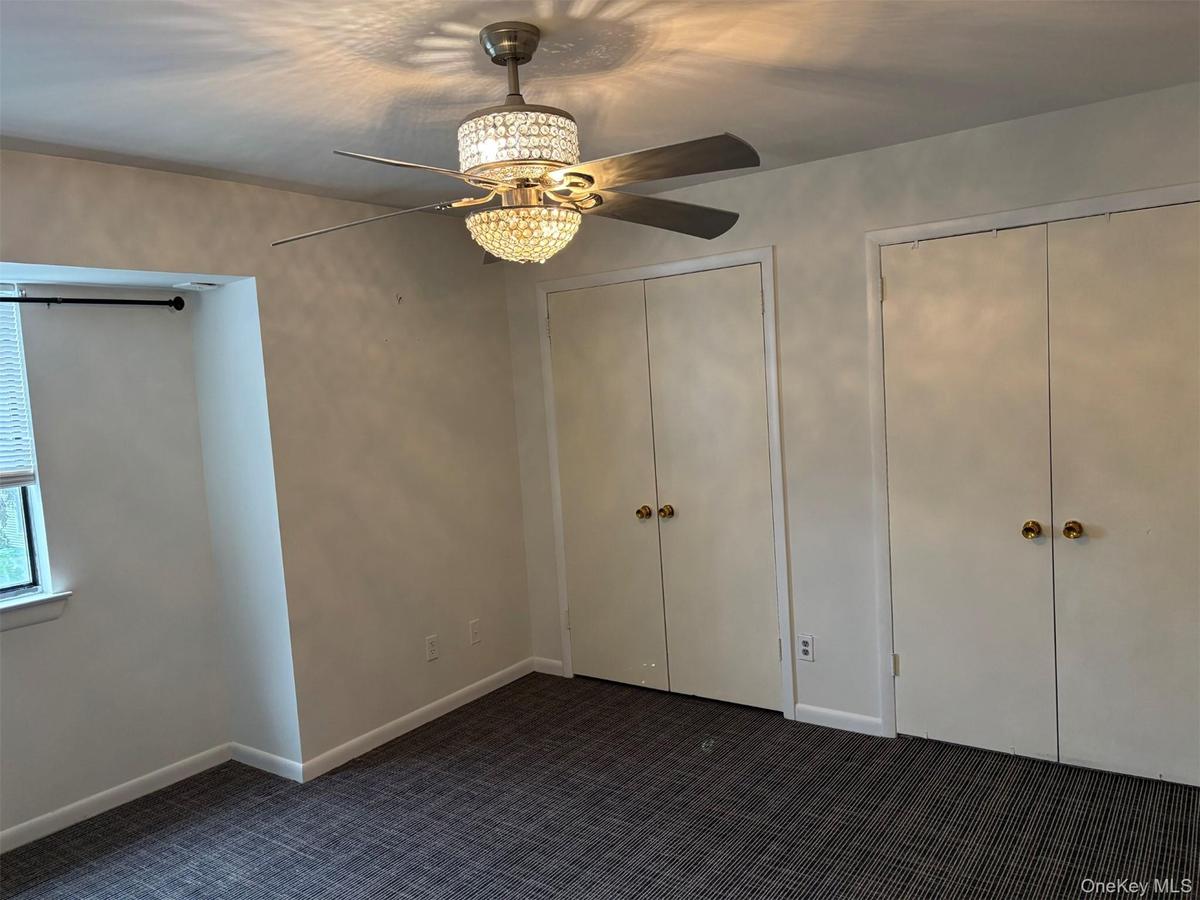 Primary bedroom on second floor with full bath