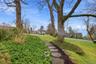 View of green lawn and Hudson River.