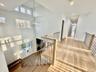 Sunlit open, airy entry.