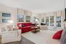 Family room featuring french doors to patio, and crown molding