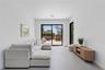 Tiled living room with baseboards and recessed lighting