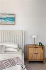 Bedroom with baseboards and radiator