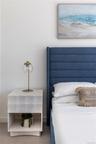 Bedroom with carpet and baseboards