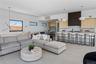Living area featuring light tile patterned flooring