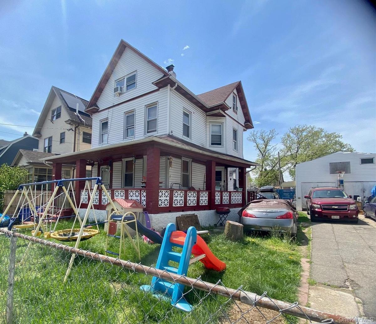 View of front of property with a porch