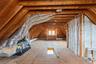 FULL ATTIC WITH PULL DOWN STAIRS FOR EASY ACCESS.