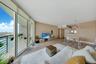 one-miami-east-3110-living-room-bay-view-floor-ceiling-glass-hardwood