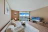one-miami-east-3110-living-room-bay-view-floor-ceiling-glass-hardwood