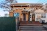 View of front of house with brick siding