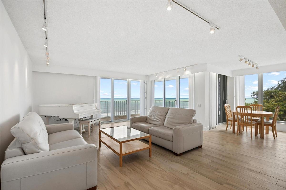 OPEN CONCEPT LIVING-DINING SPACE ALL WITH DIRECT OCEANFRONT VIEWS