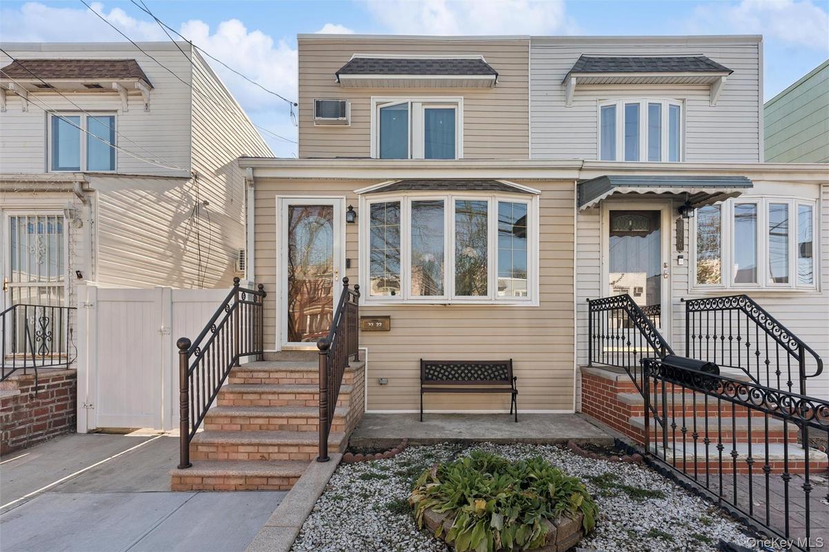Welcome to this charming semi-attached home. Conveniently located near the Long Island Railroad, this property provides easy access to transportation,