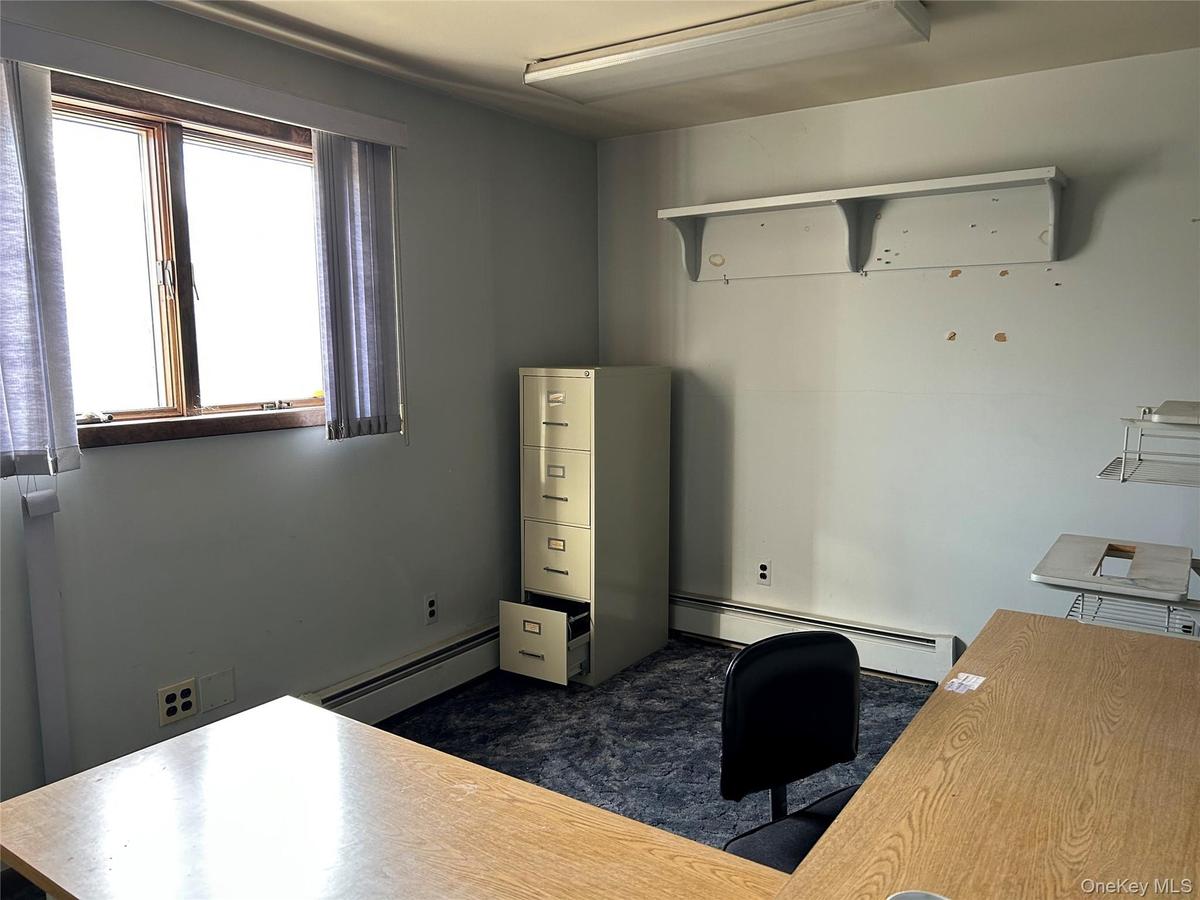 Office space featuring baseboard heating