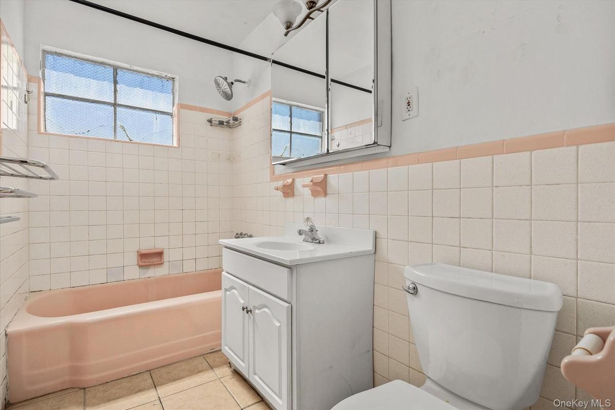 2nd Fl Bathroom. Tiled and with window.