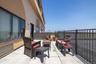 Patio has partial views of downtown Long Beach, the bay and the ocean.