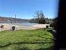 Community pool, view  of lake in the background.