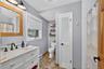 Full bath with tub off kitchen