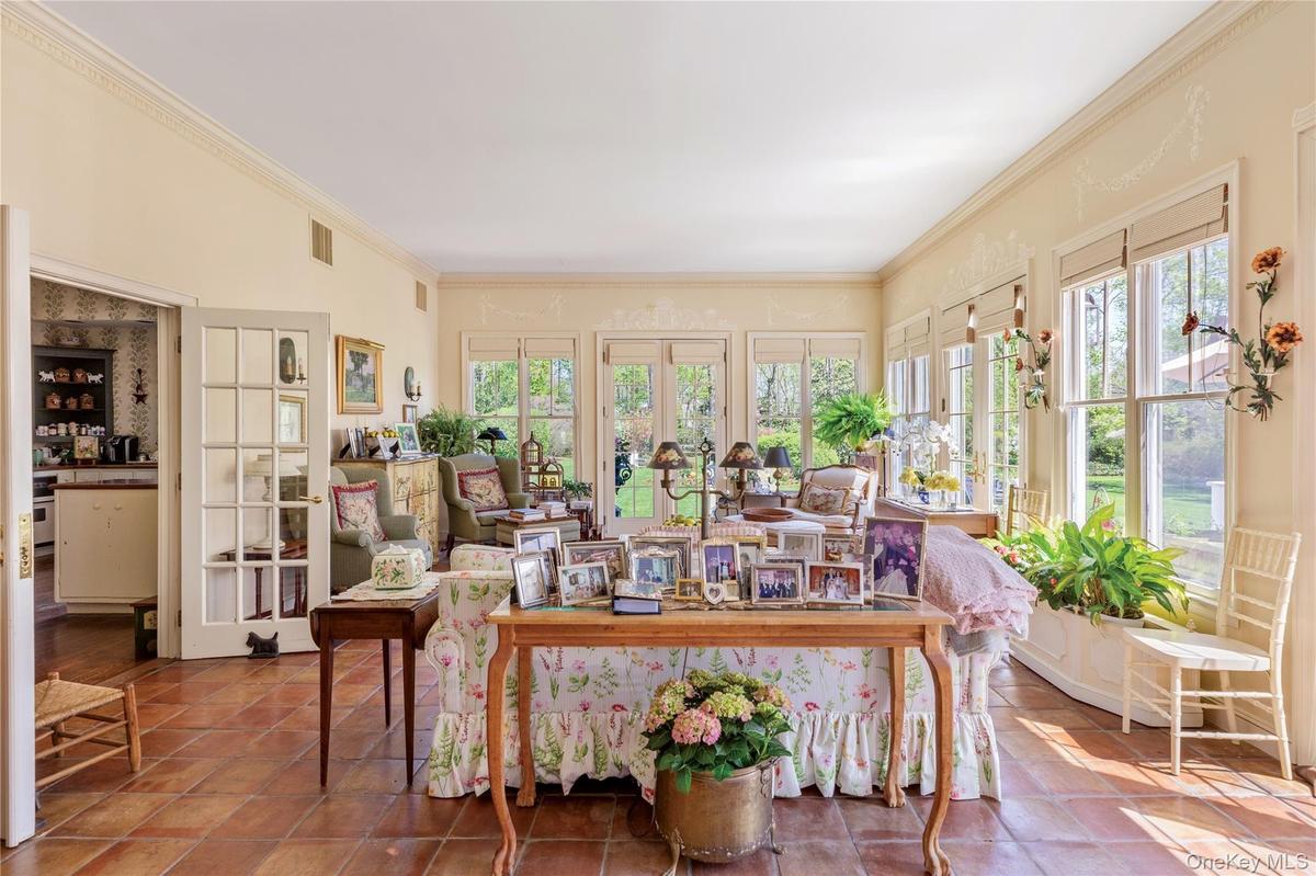 Sun Room with French Doors to Oversized Entertainer's Deck and 1.4 Acre Lot