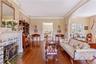 With Hardwood Floors and Original Delft Tiles around Fireplace. Entrance to Butler's Pantry and Great Room/Sunroom