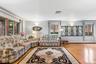 Living area featuring plenty of natural light and wood finished floors