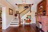 Front Entranceway with Hardwood Floors and Fireplace