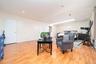 Living room featuring light wood-style floors and recessed lighting