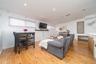 Living room featuring light wood-type flooring and recessed lighting