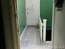 Doorway to outside featuring tile patterned floors