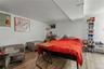Bedroom with light wood-style floors