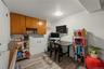Home office featuring light wood-style floors