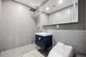 Full bath with walk in shower and vanity