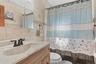 Full bathroom with window & bathtub