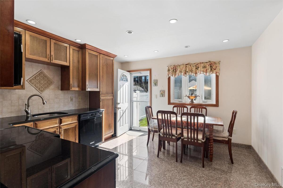 Eat-in kitchen offers a cozy space for everyday meals