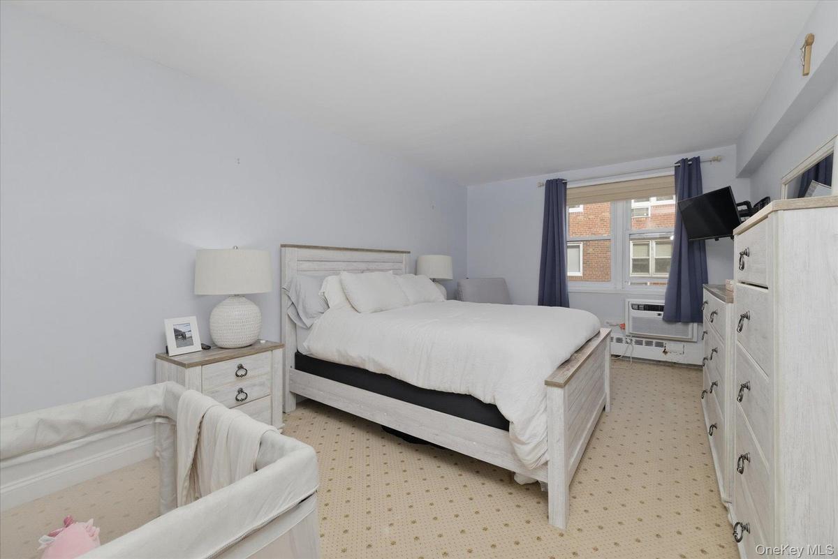 Gigantic bedroom with extra large windows