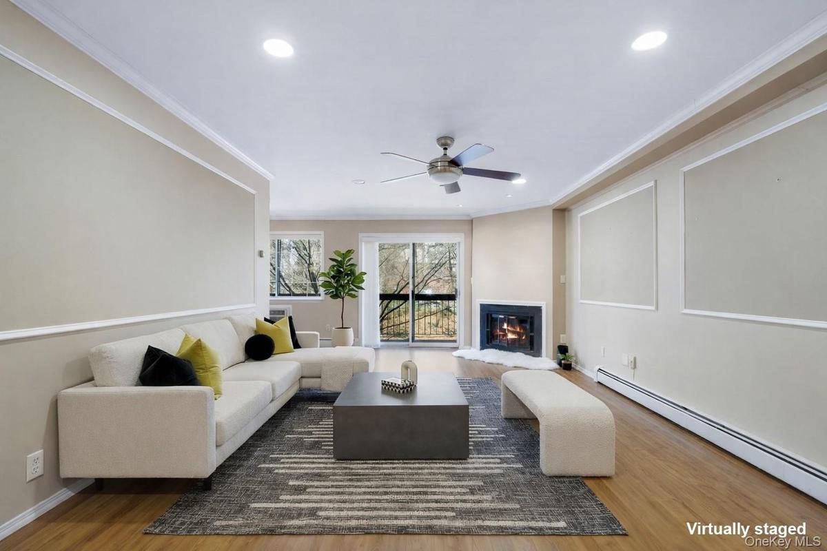 spacious living room that opens to dining room - leading to deck.