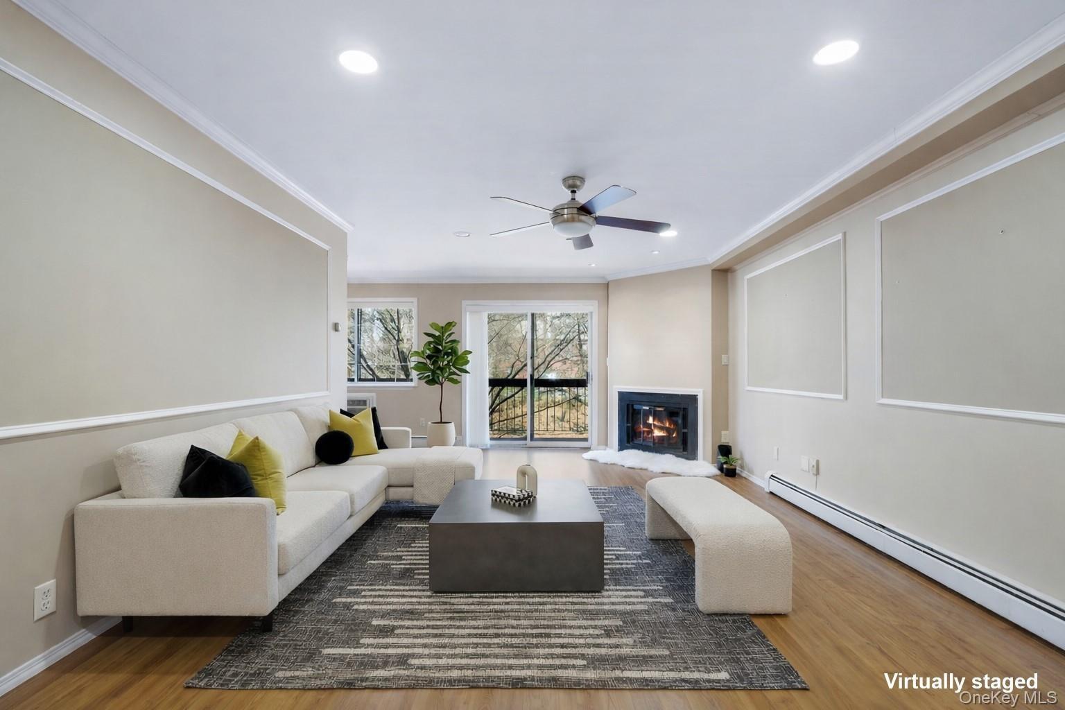 spacious living room that opens to dining room - leading to deck.