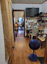 Room with wood-type flooring and ornamental molding