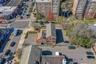 View of rear and front parking lots accommodating 12 on-site parking spaces - a rare amenity in the Village!