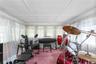 Rec room featuring carpet floors and crown molding