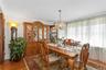 Dining room featuring a chandelier, light wood-style floors, and crown molding